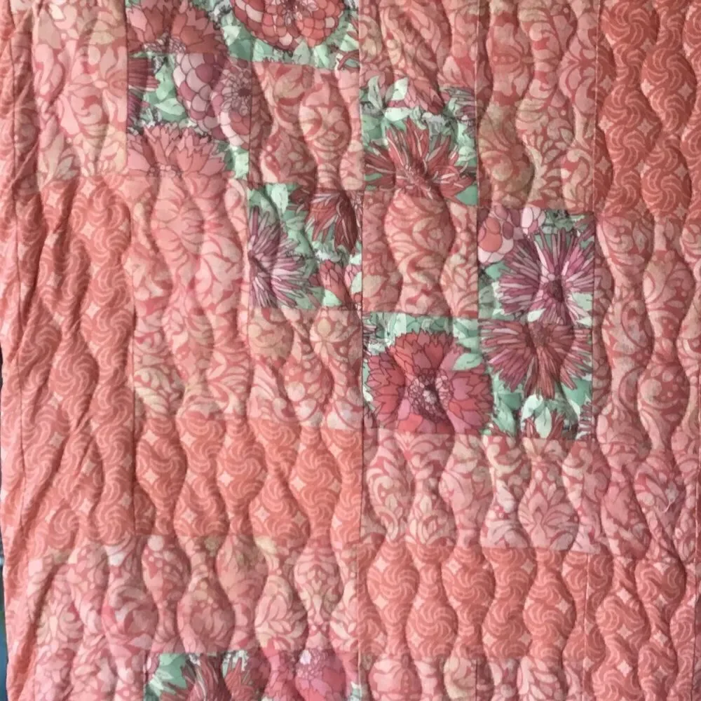 NWT. Hand Crafted Quilt in Corals